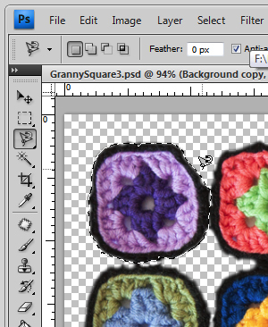 A close up of granny square fabric editing in Photoshop