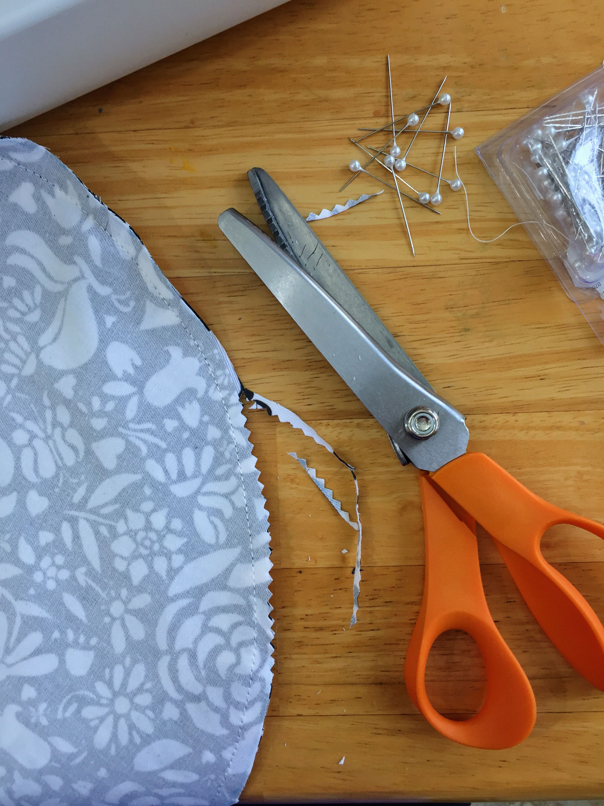 Pinking shears to trim excess fabric