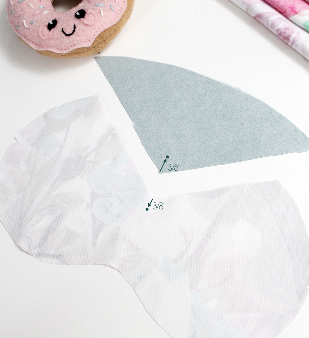 Make a small dot on the back of the fabric ⅜” directly above the point of the Upper Mask, and ⅜” below the point of the Lower Mask | Spoonflower Blog
