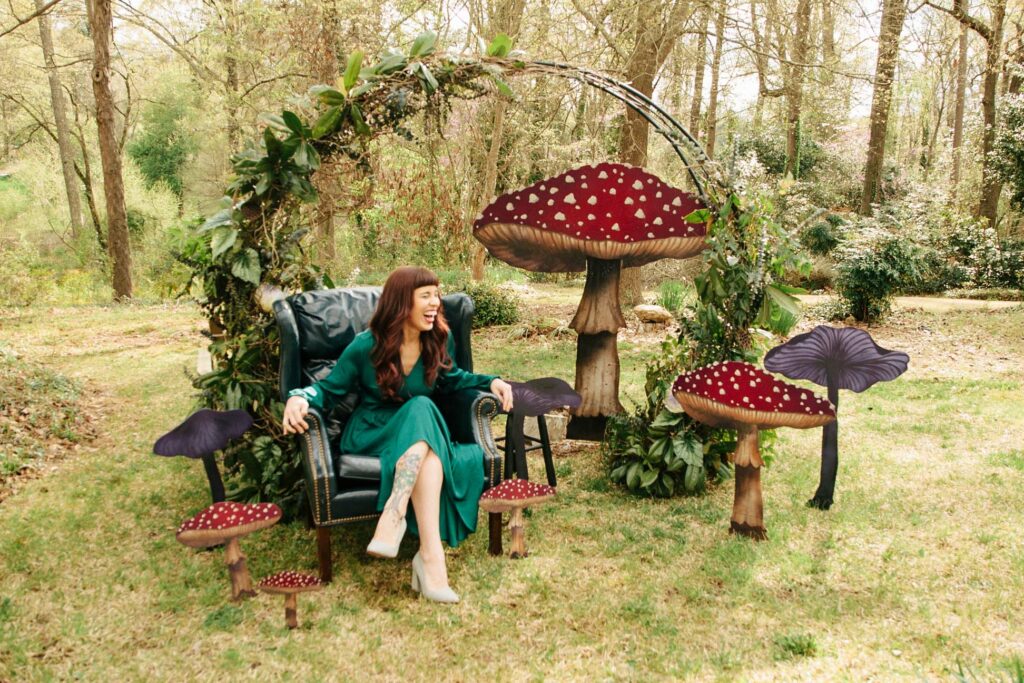 Photo backdrop featuring over-sized mushrooms in the woods | Spoonflower Blog 