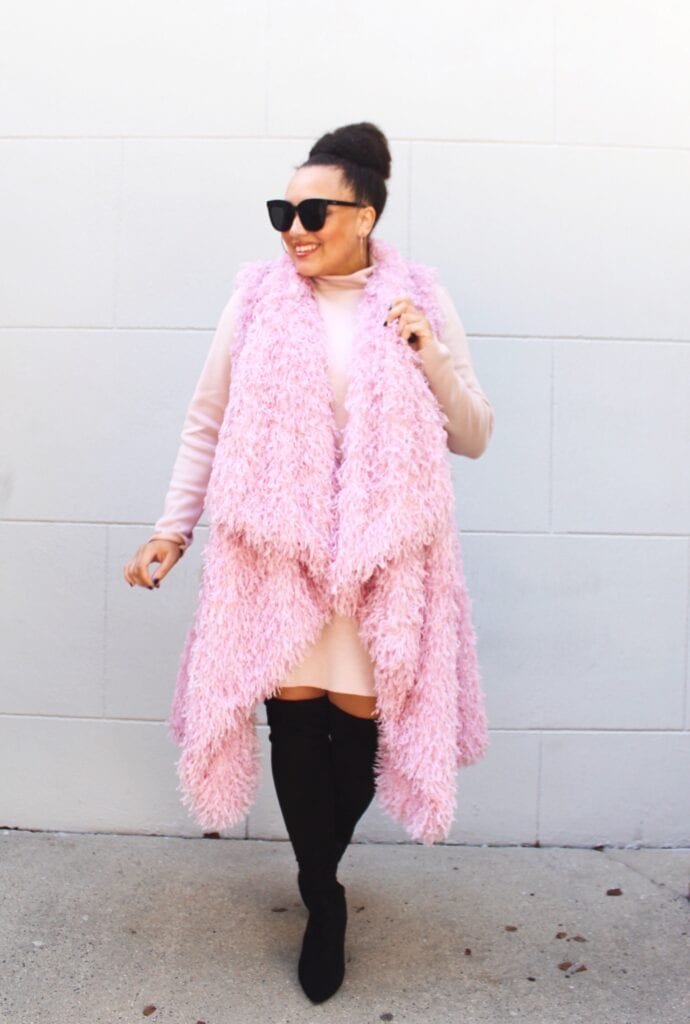 Raven in a fuzzy pink outfit