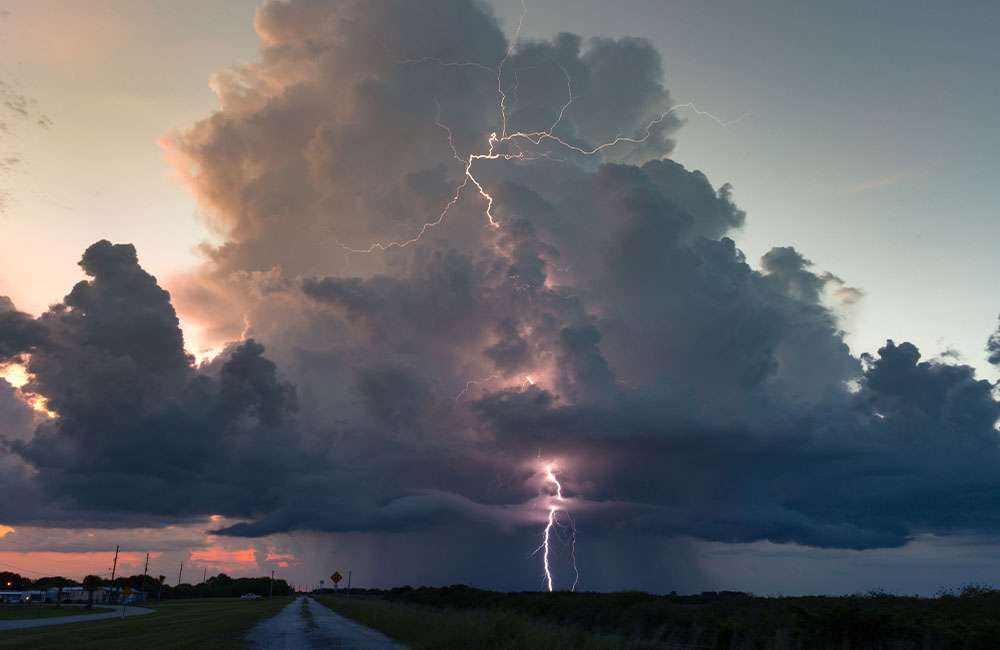 Lightning clouds during a sunset