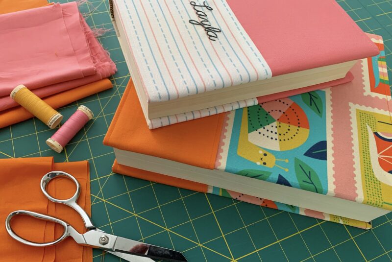 Books with brightly colored handmade book covers