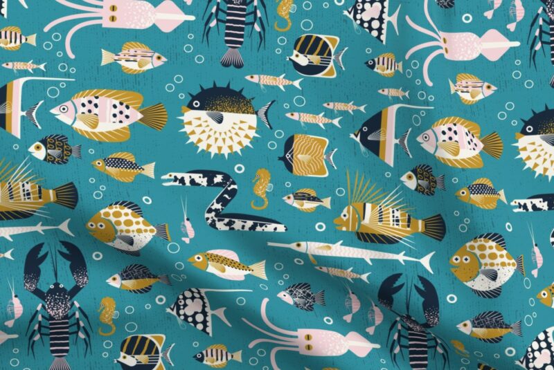 Fabric design with a wide range of dark yellow, white, navy and pink sea creatures, including squids, pufferfish and seahorses, swimming in a teal sea.