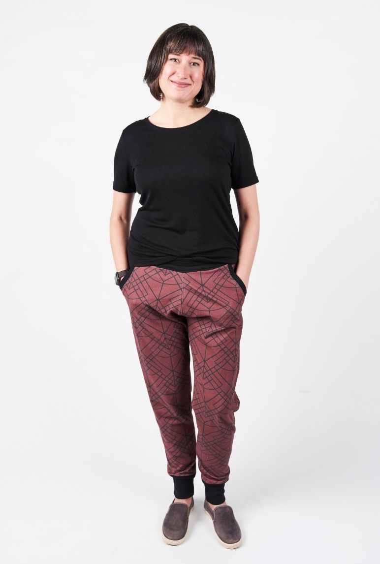 Emily wearing her dark red joggers with a black geometric design
