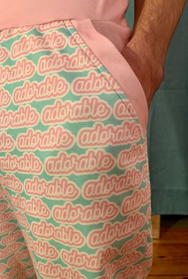 Jocelyn wearing his pink joggers with "adorable" written all over