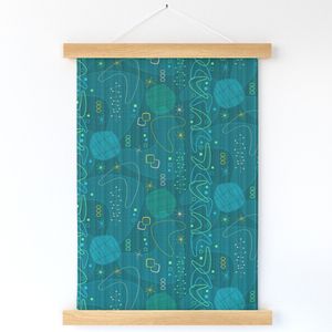 A wallhanging hanging against a white wall features 50's retro shapes, including boomerang like shapes and circles in green and blue on a striped teal background repeat on a half-dro against a dark turquoise.