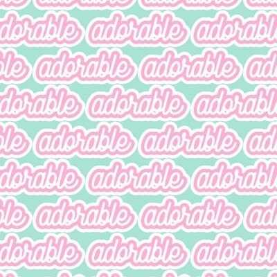 Design with the word "adorable" repeating in pink and blue