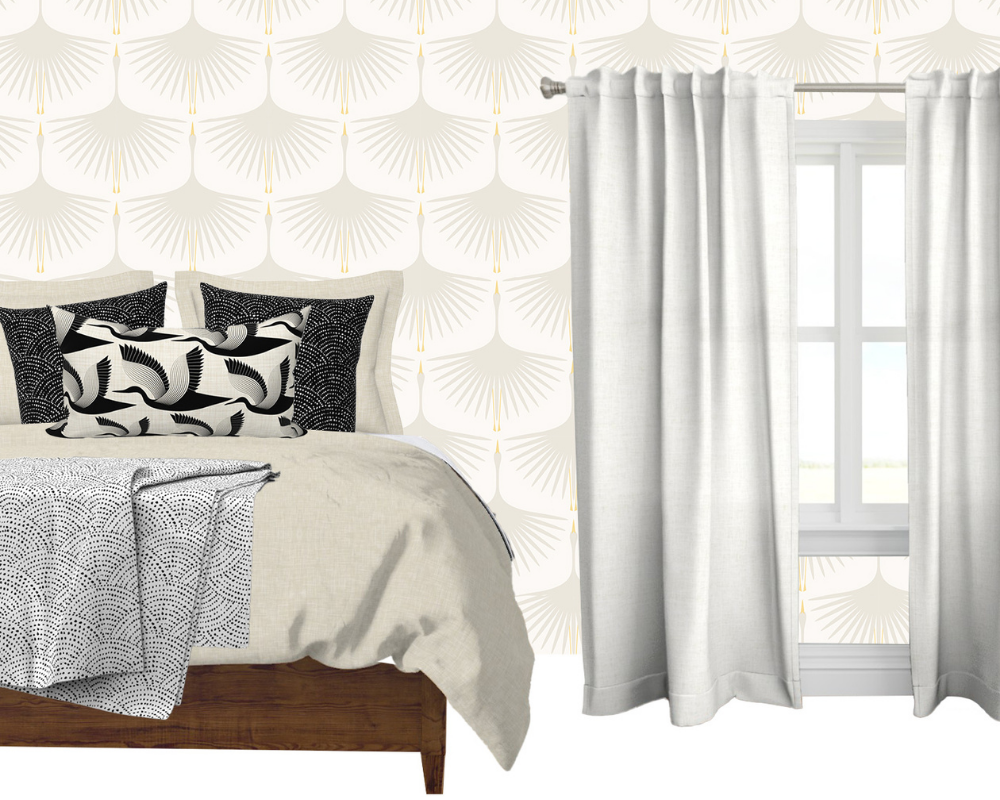 A mockup of a room featuring a bed with a cream bedspread, black-and-white pillows (one is a lumbar pillow with black cranes with white-and-black wings), and a white-and-gray throw blanket at the foot. The wallpaper has repeating rows of large white cranes flying upward and there are white curtains.