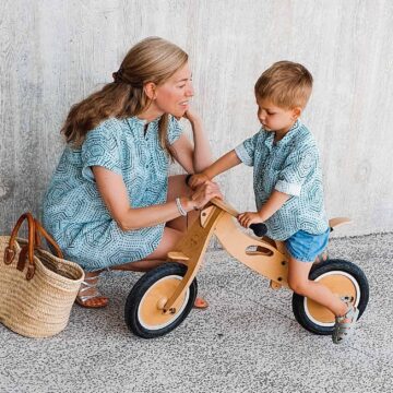 Belgian Seamstress Clio Deprest with her son in a gender-neutral matching outfit made from Spoonflower fabric.
