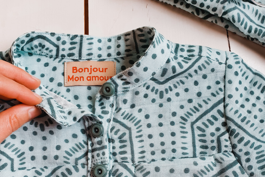 Gender-neutral blue boho blouse made from Spoonflower fabric Caption: Boho Painted Pine on Mint Fabric by designdn