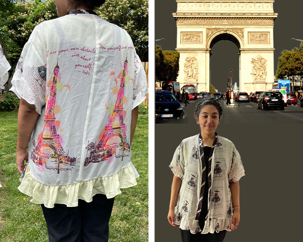 Two photos are side by side in a rectangle. On the left, the back of Lena's self-drafted waist-length robe. The bottom hem has a yellow ruffle and the back has two Eiffel Towers on a white background. On the right, Lena wears the robe superimposed in front of the Eiffel Tower. The front of the robe features a repeating design of a woman wearing a wide brim black hat and a full black dress.