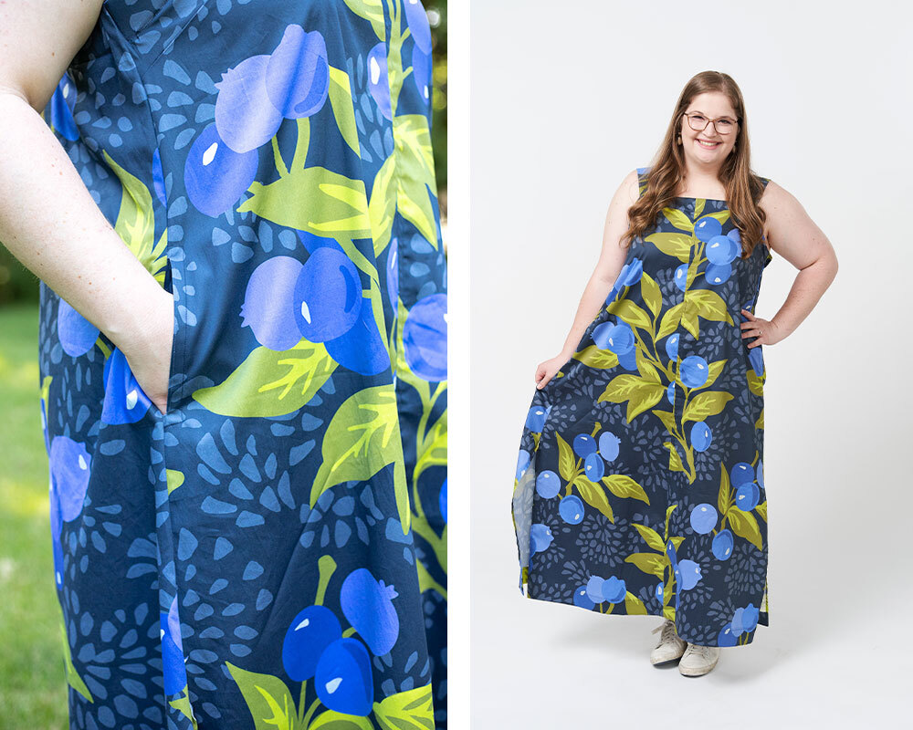 Two photos have been placed side by side in a rectangle. On the left, a close up of the side seam and pocket of Katie’s maxi dress. Katie’s right hand is in the pocket. On the right, a full-length shot of Katie’s maxi dress. Katie is looking at the camera and smiling and standing in front a white background. The design on the dress features large repeating blueberries and green leaves and stems on a navy background.