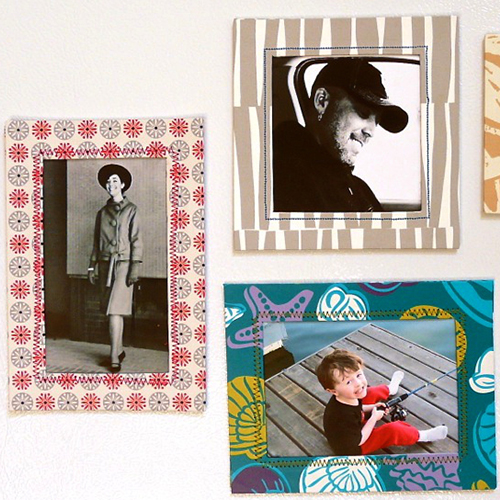 Colorful wallpaper borders made cute and decorative frames for three photos stuck to a white metal surface
