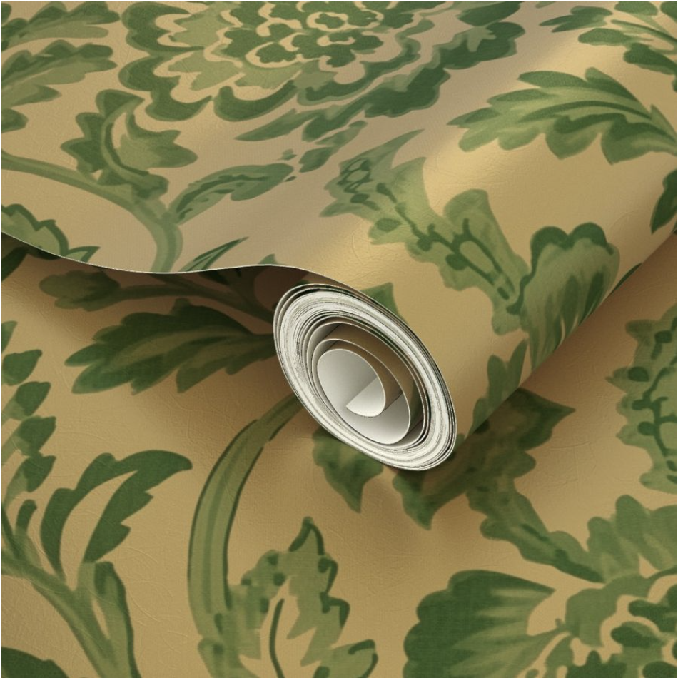 A close-up look at a wallpaper roll with green flowers and leaves on a gold background as used in a Spoonflower design render. The render is showing how the design will be printed on Gold Metallic Wallpaper.